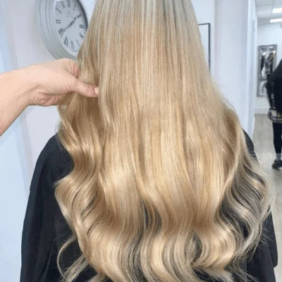 natural sandy blonde tape in hair extensions