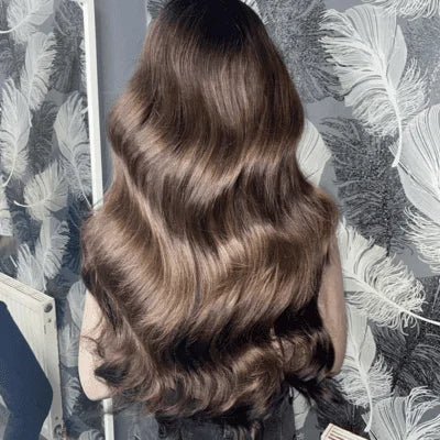 mousey brown tape in hair extensions