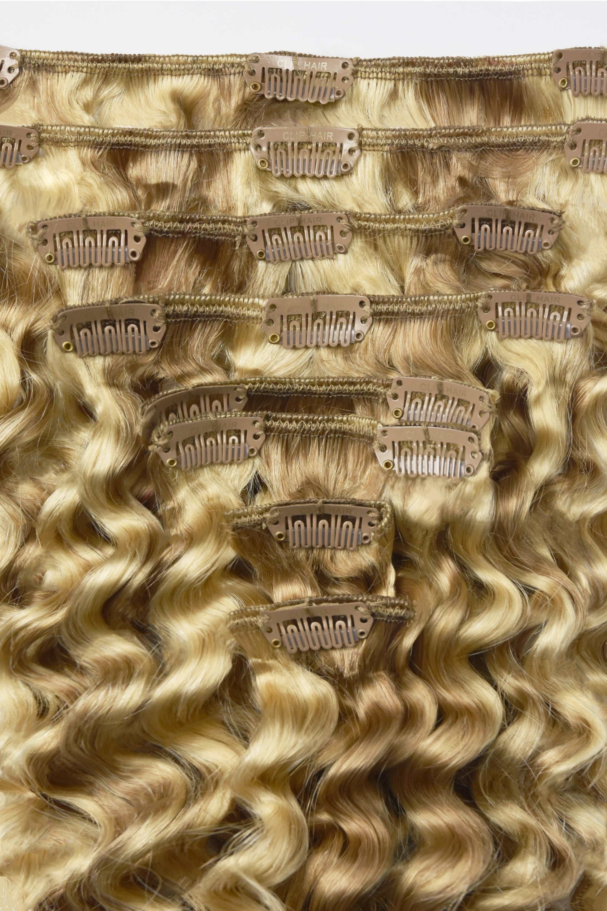 Curly clip in hair extensions 100% human hair 