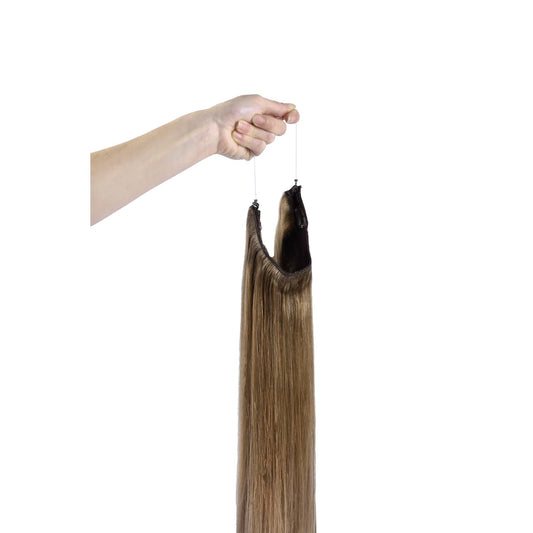 Dark Blonde (#14) Halo Hair Extension: Hand holding extension