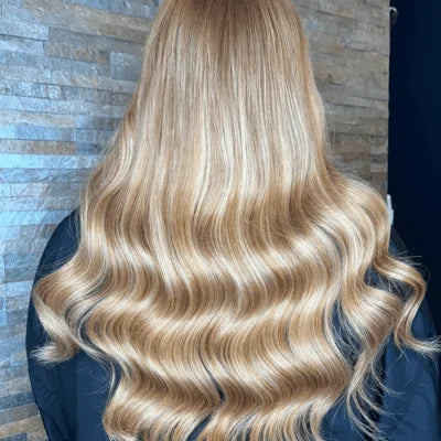 strawberry blonde tape in hair extensions