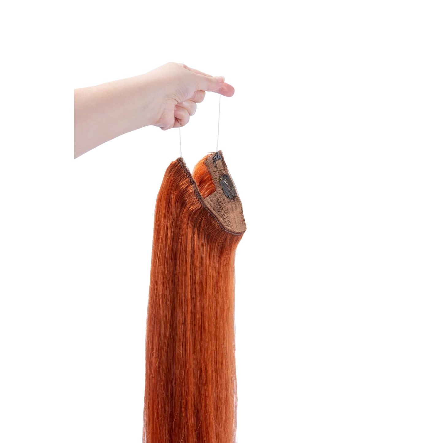 Hand Holding Flaming Ginger (#350) Halo Hair Extensions
