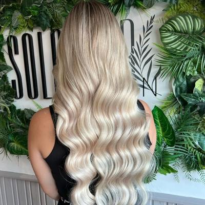 customer using tape-in hair extension