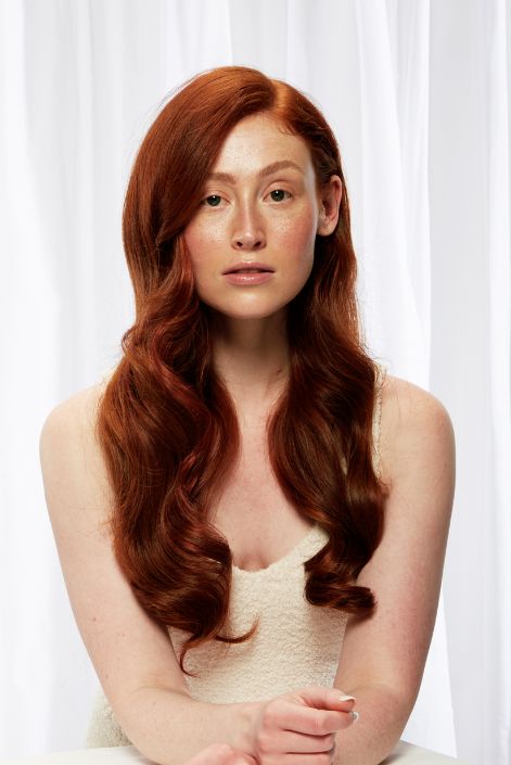 model after adding dark auburn hair extension
