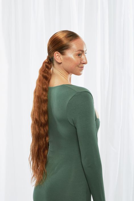model after adding light auburn hair extension