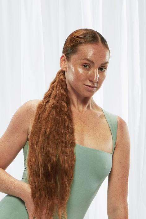 model after adding light auburn hair extension