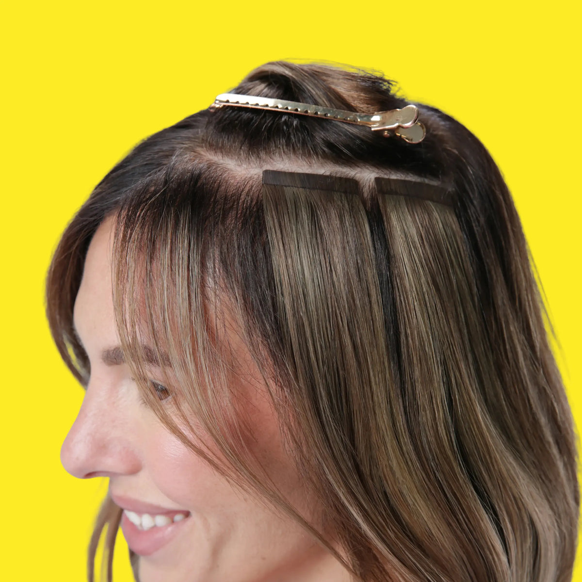 Darkest Brown (#2) Tape In Hair Extensions in use