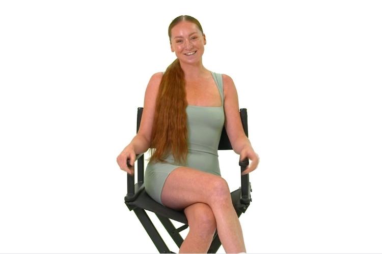 model wearing light auburn hair extension video thumbnail