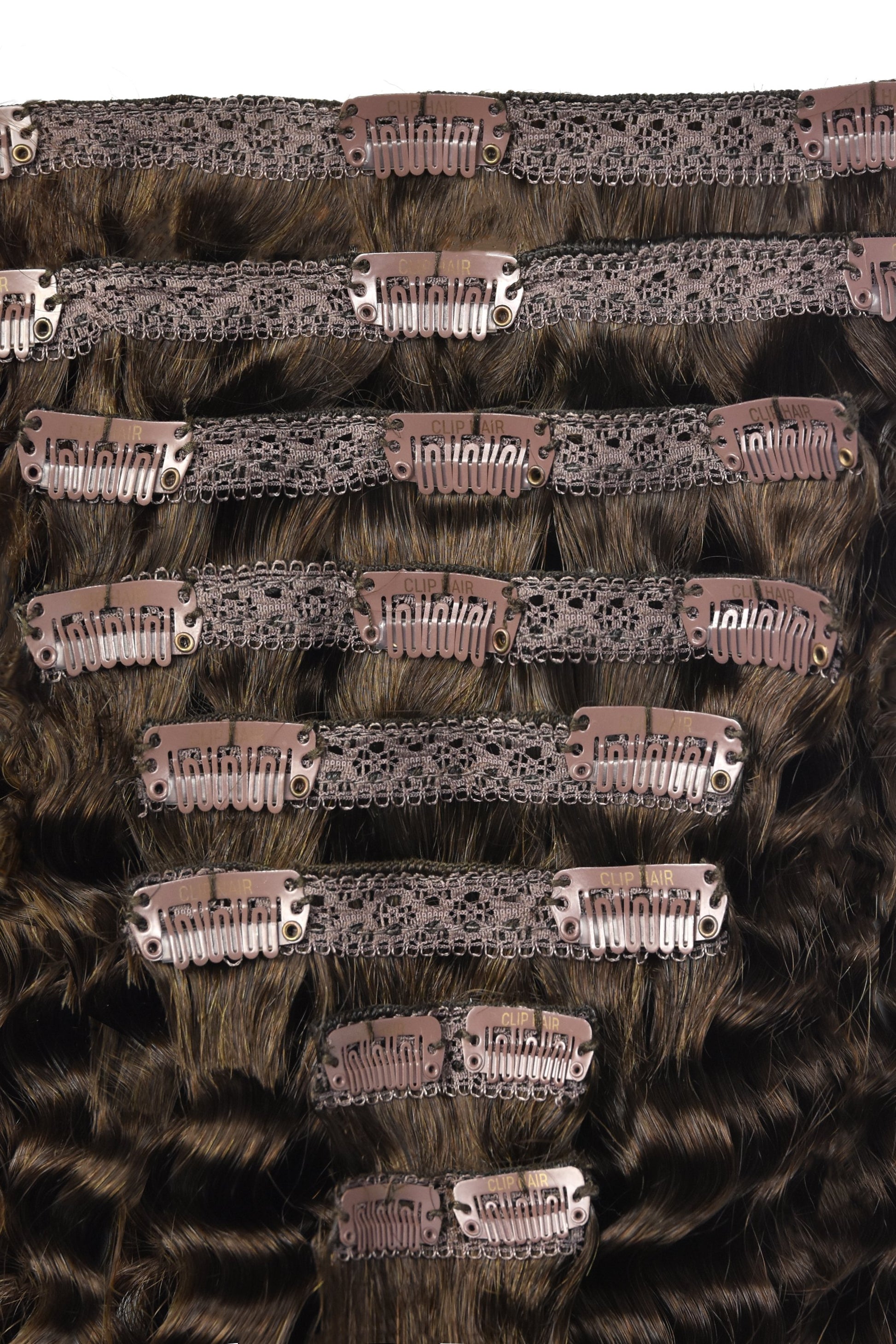 clip in curly hair extensions close up of shade 4 medium brown